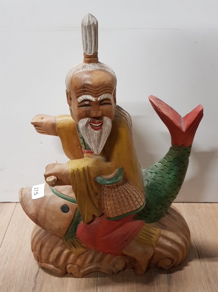 HAND CARVED AND PAINTED WOODEN CHINESE MAN ON FISH