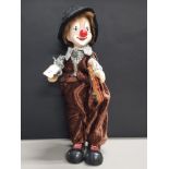 MUSICAL PORCELAIN HEADED CLOWN MADE BY GIUSEPPE ARMANI