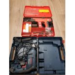 BOXED HILTI NAIL GUN IN CASE DX 450 TOGETHER WITH BOSCH IMPACT DRILL