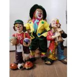 LARGE CLOWN DOLL WITH RATTAN CHAIR TOGETHER WITH 2 MORE CLOWN FIGURES CLOWN PLAYING TRUMPET AND