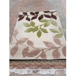 TRAILING LEAF PATTERNED RUG 160CMS X 110CMS