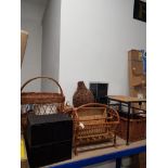 A LARGE QUANTITY OF STORAGE CHESTS AND WICKER BASKETS