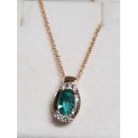 9CT GOLD DIAMOND AND EMERALD PENDANT ON 9CT GOLD CHAIN 2.3G