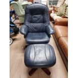 BLUE LEATHER BUTTONED BACK RELAXER ARMCHAIR AND MATCHING FOOTSTOOL