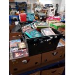 3 BOXES CONTAINING BOOKS DVDS ETC