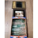 A BOX OF VINTAGE GLASS BOTTLES TOGETHER WITH 2 FRAMED ITEMS ONE BRASS