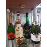 4 ASSORTED BOTTLES INC BELLS SCOTCH WHISKY BUCKS FIZZ ETC