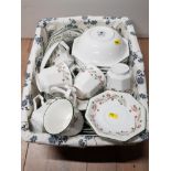 WICKER BASKET CONTAINING A LARGE QUANTITY OF JOHNSON BROTHERS FLORAL PATTERNED CHINA