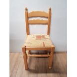 A SET OF 4 BEECH FRAMED DINING CHAIRS