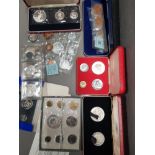 QUANTITY OF VARIOUS COIN SETS FROM AROUND THE WORLD INCLUDING SILVER COINAGE