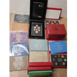 BOX CONTAINING A LARGE QUANTITY OF COINAGE PROOF SETS FROM GREAT BRITAIN AND NORTHERN IRELAND