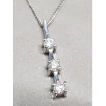 10CT WHITE GOLD THREE STONE DIAMOND PENDANT AND CHAIN