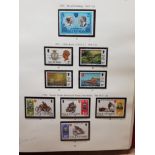 STANLEY GIBBONS ISLE OF MAN VOLUME 1 STAMP ALBUM CONTAINING 1958 TO 1994 COLLECTION