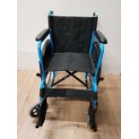 A BLUE FRAMED WHEELCHAIR