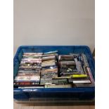 A BOX CONTAINING DVDS AND CDS