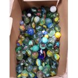 A BOX OF ASSORTED VINTAGE MARBLES