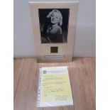 MARILYN MONROE CUT PIECE OF AN EVENING DRESS WORN BY ACCOMPANIED WITH LETTER OF AUTHENTICITY