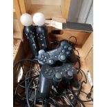 A BOX CONTAINING PS3 CONTROLLERS AND MOVE CONTROLLERS