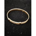 9CT GOLD PATTERNED EXPANDING BANGLE 11G