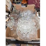 A BOX OF ASSORTED GLASS INCLUDES DECANTERS AND STOPPERS ETC