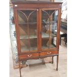 INLAID MAHOGANY REGENCY DISPLAY CABINET WITH SPADE SUPPORT
