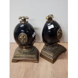 PAIR OF ORNATE EGG BOOKENDS