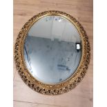 OVAL SHAPED ORNATE FRAMED MIRROR