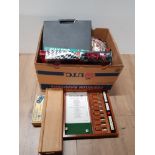 A BOX CONTAINING ASSORTED GAMES INC DICE GALLERY ETC