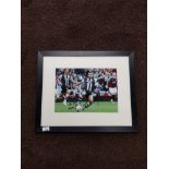 FRAMED AND SIGNED NEWCASTLE UNITED PHOTOGRAPH SIGNED BY YOHAN CABAYE