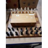 A BEAUTIFUL CHESS BOARD AND CHESS PIECES