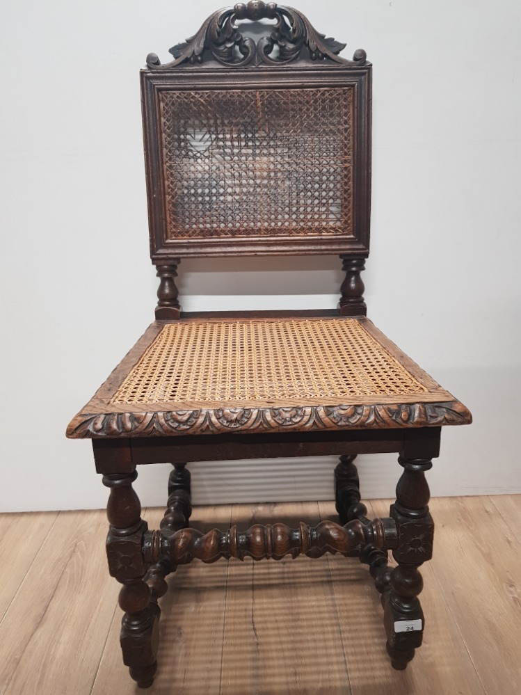 HEAVILY CARVED OAK EDWARDIAN HALL CHAIR WITH A BERGERE BACK AND SEAT