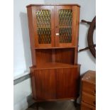 DANISH CORNER UNIT WITH ORANGE TINTED GLASS DOUBLE DOOR