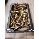 A BOX OF ASSORTED BRASS CANDLESTICKS