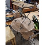 METAL FRAMED AND WICKER TABLE AND 2 MATCHING CHAIRS PLUS DRINKS STAND