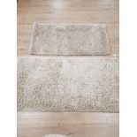 2 BROWN MODERN SHAGPILE RUGS 1 LARGE 80 X 150CM AND 1 SMALL 67 X 130CM