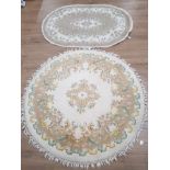 FRINGED CIRCULAR SHAPED FLORAL PATTERNED RUG WITH 1 OTHER