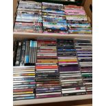 2 BOXES OF ASSORTED DVDS AND CDS