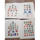 STAMP ALBUM CONTAINING A LARGE QUANTITY OF LOOSE STAMPS FROM AROUND THE WORLD INCLUDING SOUTH