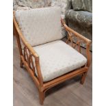 CANE ARMCHAIR WITH CREAM CUSHIONS