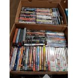 2 BOXES OF ASSORTED DVDS