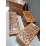 CARVED CASED CRIBBOARD AND 2 HEAVILY CARVED ORIENTAL STYLE TABLE BOXES PLUS ONE OTHER