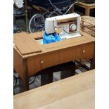 SINGER SEWING MACHINE AND TABLE