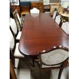 REPRODUCTION MAHOGANY EXTENDING DINING TABLE AND 8 SHIELD BACK CHAIRS