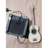 ROCKET 10 LEAD AMPLIFIER AND CHILDS ACOUSTIC GUITAR