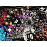 BASKET OF COSTUME JEWELLERY BY FASHION BANGLES AND NECKLACES