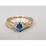9CT GOLD BLUE STONE & DIAMOND RING 2.1G SIZE R