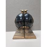 PAIR OF BOOKENDS IN THE FORM OF FAUX SPLIT EMU EGGS WITH GILT DETAILING