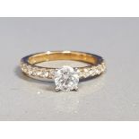 18CT GOLD DIAMOND RING 1.5CTS IN TOTAL 3.3G