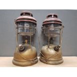 A PAIR OF BRASS TILLY LAMPS