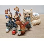 7 WEST GERMAN FIGURES INCLUDES 2 HUMMEL FIGURES AND GOEBEL CAT ETC